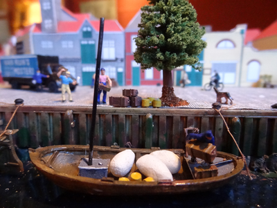 878196 Detail van de maquette van het noordoostelijk deel van ‘Wijk C anno 1925’, gemaakt door stagiaires van het ...